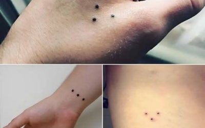 El misterio de los tres puntos tatuados: un emblema con múltiples interpretaciones